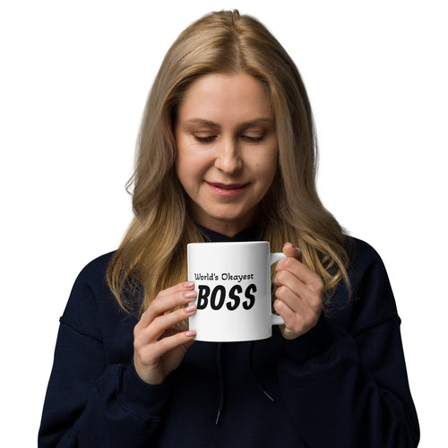 World's Okayest Boss 20 oz white ceramic coffee mug, handle on right